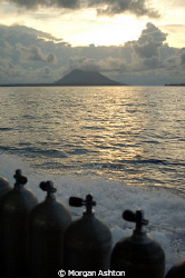 The long boat ride home. Bunaken National Marine Park. Ta... by Morgan Ashton 